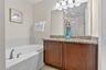 Full Spa Like Ensuite with Garden Tub and Glass Enclosed Shower