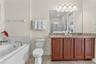 Ensuite Primary Bath with Garden Tub and Glass Enclosed Shower