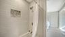Shower/tub combination in primary bath.