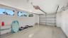 Newly cleaned and painted 1 car garage with epoxy floor.