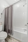 View of Shower/Bath Combo in Jack in Jill bathroom