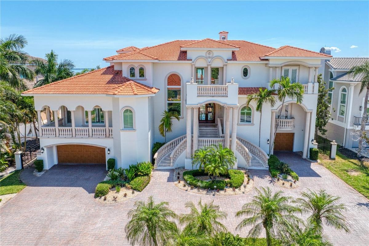 Striking front elevation of this exceptional Tierra Verde luxury residence.