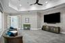 Another view of the social lounge, highlighted by plush luxury carpeting.