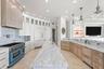 Refined kitchen overlooking the family room.