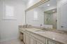 Top level bedroom two, ensuite with expanive vanity.