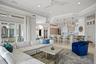 A beautifully integrated layout blends the kitchen and family room into one expansive gathering space.