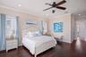 Alternate view of the main level, primary suite, showcasing the entrance to the ensuite.