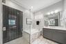 Dual vanities & private water closet, separate shower/tub