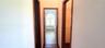 Hallway from Primary Bedroom to En-suite bath w/double closets on each side