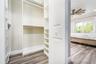 His custom walk in closet