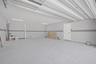 Oversized 2 car garage with epoxy flooring.