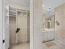 Custom closet adjacent to master suite