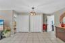Large eating area open to family room and kitchen