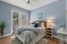 Guest Bedroom with French Doors to a Garden Patio