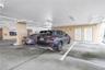 Designated Under building parking space #205