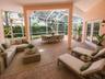 Virtually staged patio with full screened birdcage