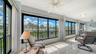 34' screened and glass lanai that runs the length of the unit.