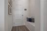 Entry vestibule just off the spacious one-car garage