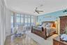 Primary Bedroom with access to the East Bay View Balcony with Plantation Shutters throughout