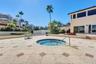 Grand Bay Swimming Pool  heated spa area and Barbecue. New Patio Furniture, Lounge Chairs, Sofa's, Umbrellas and Barbecue Area