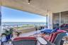Residence Large tiled Patio Bay Views. Living Room and primar