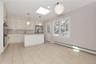 Another angle view of Kitchen, Door to wood deck