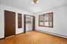 Flexible First Level Space for use as Den/Office/Guest Room and  Laundry Closet