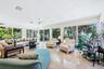 Extended living room/family room has panoramic views overlooking the Gulf
