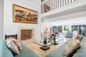 Living room features a wood burning fireplace