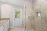 Primary bath with large walk-in shower