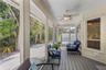 Peaceful screened lanai for unwinding