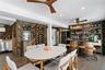 Wine room / entertaining space with a full bathroom.
