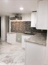 Unit#2 Basement Kitchen off the hallway, open airy layout
