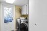 Second level laundry room.  Door leads to east facing balcony with partial Intracoastal views.