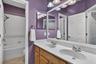Guest bathroom on second story conveniently located for the guest bedrooms to share.