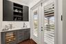 Master bedroom wet bar with Subzero wine cooler
