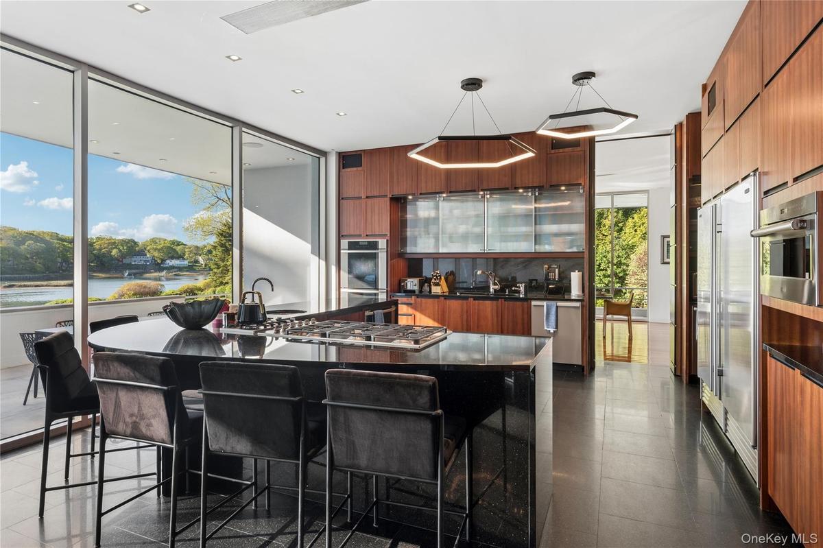 Eat-In Kitchen with Miele and Sub Zero Appliances