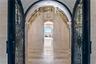 Arched Iron doors welcome you to Palazzo Sul Mare!   Opens to water views and a gallery corridor designed for art display and dramatic transitions bet