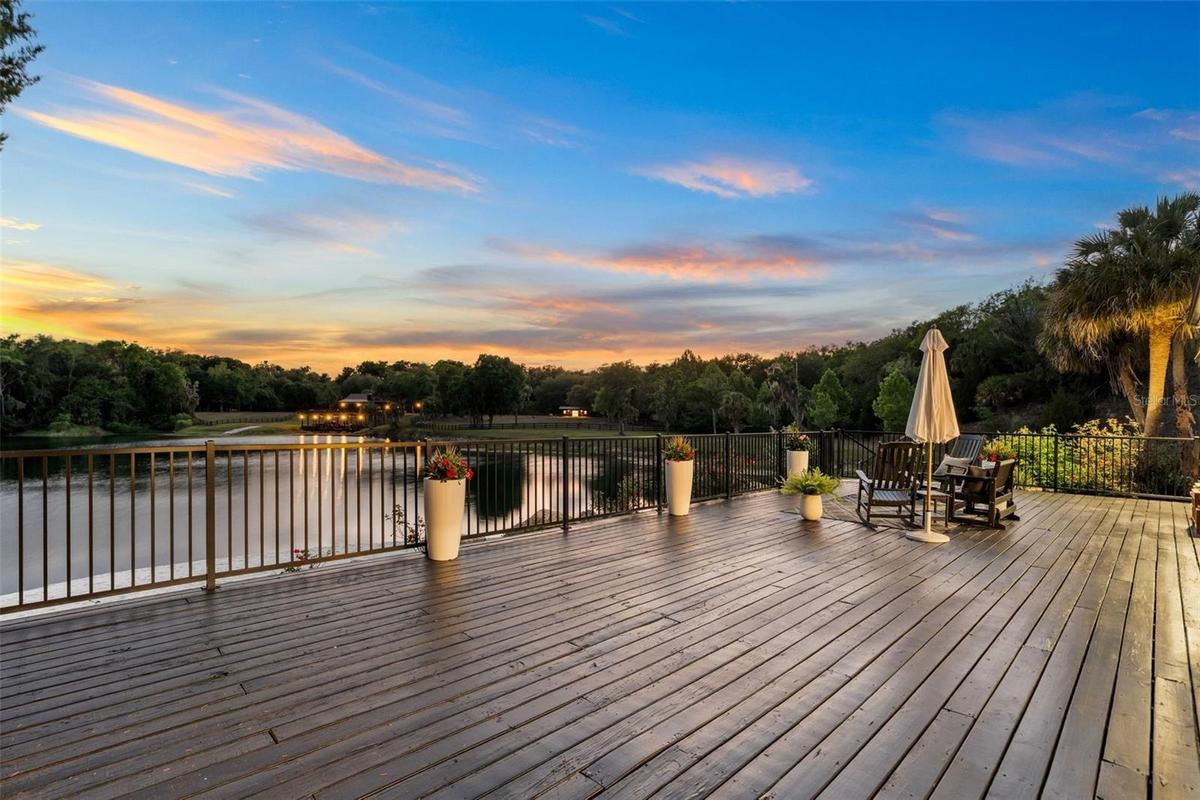 Rear porch overlooking the lake on the main home
