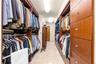 This is the kind of walk-in closet that feels like a reward, spacious, elegant, and thoughtfully designed to finally enjoy a space entirely your own.