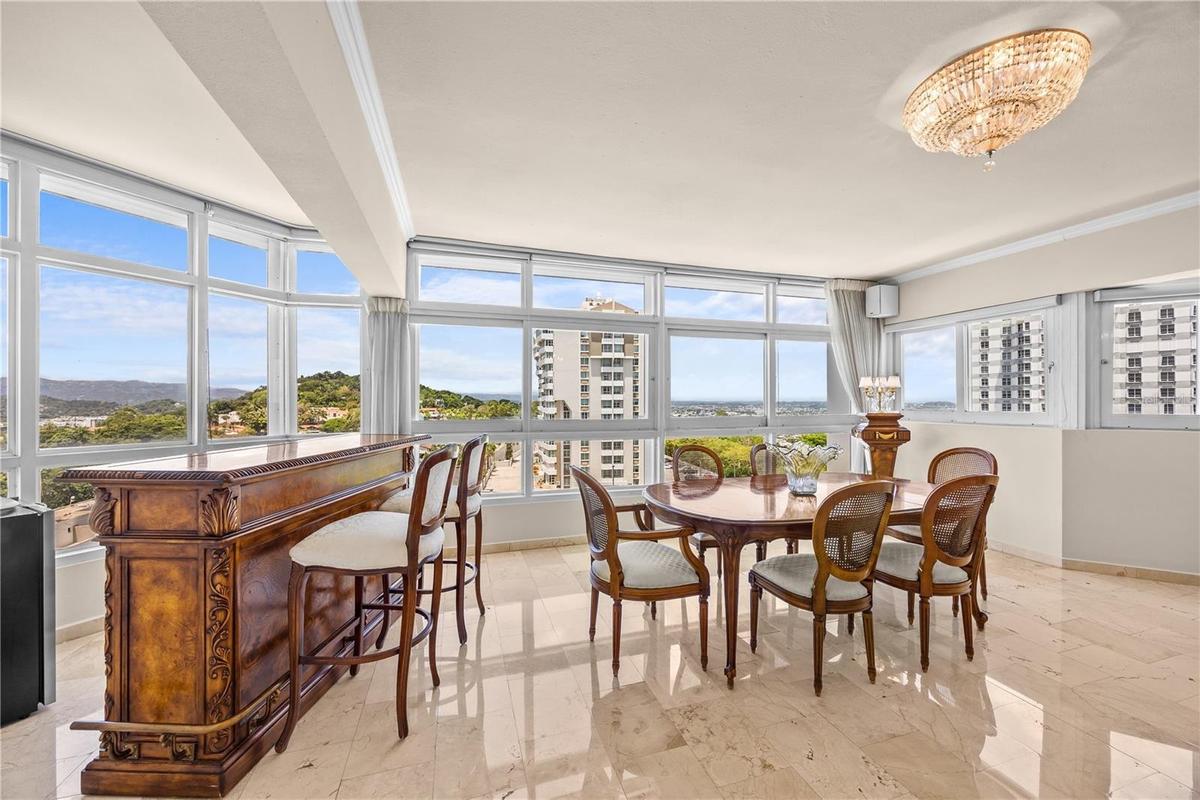 Enjoy dinner or a glass of wine with friends, framed by beautiful mountain views.
