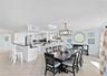 Spacious dining area with water views.