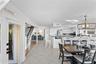Two breakfast bars with seating for 8 plus Dining Area with seating for 8 more!