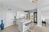kitchenette — ideal for entertaining or multi-generational living. Quartz countertops.