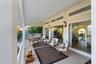 Large Lania outside main family Room and living Room, large wall to wall picture windows for water and beach views.
