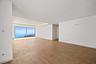 Penthouse living and dining area ocean views