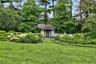 Guest cottage tucked away in the gardens