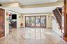 Building lobby with stairs and recessed lighting
