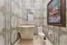 Half bath downstairs near the kitchen and family room