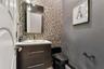 Half bath upstairs near the game room and theatre room